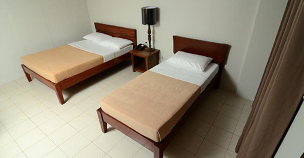 Isabel Suites Laoag Habitación foto